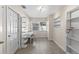 Cozy office space with built-in shelves, desk, and natural light at 5657 Oceanic Rd, Holiday, FL 34690