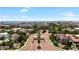Beautiful aerial view of the community with lush landscaping and the ocean in the distance at 6113 Yeats Manor Dr, Tampa, FL 33616
