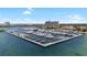 Aerial view of a square marina with docked boats surrounded by water and residential buildings at 6113 Yeats Manor Dr, Tampa, FL 33616