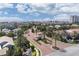 Aerial shot showcasing a gated community entrance with lush landscaping and manicured lawns at 6113 Yeats Manor Dr, Tampa, FL 33616