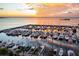 Scenic marina at sunset, with numerous boats and reflections on the water at 6113 Yeats Manor Dr, Tampa, FL 33616