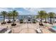 Elevated view of marina showcasing palm trees, outdoor seating, and multiple boats at 6113 Yeats Manor Dr, Tampa, FL 33616