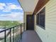 Balcony with a view of the city skyline and lush green trees at 650 Island Way # 408, Clearwater Beach, FL 33767