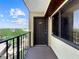Balcony with a view of the city skyline and lush green trees at 650 Island Way # 408, Clearwater Beach, FL 33767