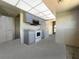 Unfinished kitchen featuring blue cabinets, a range oven, and ample space, ready for renovation at 650 Island Way # 408, Clearwater Beach, FL 33767