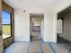 Bright living room undergoing renovations, providing a blank canvas for future decor at 650 Island Way # 408, Clearwater Beach, FL 33767