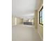 Open concept living room with kitchen island, large windows, and neutral colors for a modern feel at 650 Island Way # 408, Clearwater Beach, FL 33767