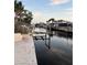 Waterfront view of canal, docks, and nearby homes on a sunny day at 6820 26Th W St, Bradenton, FL 34207