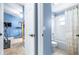 Bright bathroom featuring a tub with shower and neutral accents at 8814 N River Rd, Tampa, FL 33635