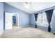 Bedroom featuring an open doorway and large window allowing plenty of light at 8814 N River Rd, Tampa, FL 33635