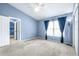 Bright bedroom with closet and large window offering plenty of natural light at 8814 N River Rd, Tampa, FL 33635
