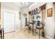 Bright breakfast nook features high ceilings, elegant window treatments, and tile floor at 8814 N River Rd, Tampa, FL 33635