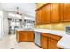 Kitchen featuring wooden cabinets, stainless steel appliances and breakfast nook with tile floors at 8814 N River Rd, Tampa, FL 33635