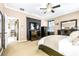 Well-lit main bedroom with an adjacent dining area and an additional safe at 8814 N River Rd, Tampa, FL 33635