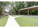 Community playground featuring a covered picnic area and a play structure at 8814 N River Rd, Tampa, FL 33635