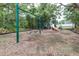 A view of a neighborhood playground with swings and slides at 8814 N River Rd, Tampa, FL 33635