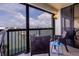 Outdoor space with comfortable seating and views of the marina and city skyline at 9525 Blind Pass Rd # 505, St Pete Beach, FL 33706