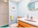 Bathroom features a tub/shower combo and decorative mirror at 9525 Blind Pass Rd # 505, St Pete Beach, FL 33706