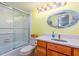 Bright bathroom featuring a shower/tub combo and stylish mirror at 9525 Blind Pass Rd # 505, St Pete Beach, FL 33706