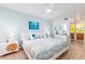 This bedroom has neutral walls and beach-themed decor, and an ensuite bathroom at 9525 Blind Pass Rd # 505, St Pete Beach, FL 33706