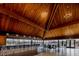 Clubhouse interior with wooden ceiling and bar, overlooking the bay at 9525 Blind Pass Rd # 505, St Pete Beach, FL 33706