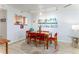 Bright dining room with modern lighting and a stylish rug, perfect for entertaining guests at 9525 Blind Pass Rd # 505, St Pete Beach, FL 33706