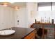 Bright kitchen with updated cabinetry, modern lighting, and bar for entertaining at 9525 Blind Pass Rd # 505, St Pete Beach, FL 33706