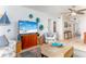 Inviting living room with stylish decor and access to other areas of the condo at 9525 Blind Pass Rd # 505, St Pete Beach, FL 33706
