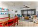 Open-concept living and dining area with large windows and modern decor at 9525 Blind Pass Rd # 505, St Pete Beach, FL 33706