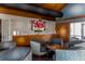 Resident lounge with comfortable chairs, a TV, and ample seating at 9525 Blind Pass Rd # 505, St Pete Beach, FL 33706