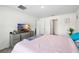 Relaxing main bedroom features a queen-sized bed, soft carpet, and plenty of space at 10452 Elgin Blvd, Spring Hill, FL 34608