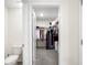 Large walk-in closet with ample hanging space and shelving at 10452 Elgin Blvd, Spring Hill, FL 34608