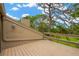This house has a spacious balcony overlooking beautiful green space and blue skies at 1111 N Bayshore Blvd # E10, Clearwater, FL 33759