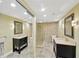 Beautiful bathroom with double vanity, walk-in shower, and tiled walls at 1111 N Bayshore Blvd # E10, Clearwater, FL 33759
