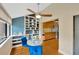 Bright dining area adjacent to kitchen with built-in shelving and natural light at 1111 N Bayshore Blvd # E10, Clearwater, FL 33759