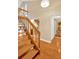 Entryway featuring wood staircase and access to hallway with closet at 1111 N Bayshore Blvd # E10, Clearwater, FL 33759