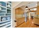 Bright kitchen adjacent to dining area with stainless steel appliances at 1111 N Bayshore Blvd # E10, Clearwater, FL 33759