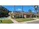 The community clubhouse with its welcoming entrance and well-maintained landscaping offers a central gathering place at 11511 113Th St # 4F, Seminole, FL 33778