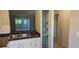 Kitchen with sink, cabinets, counter tops and built in storage at 11511 113Th St # 4F, Seminole, FL 33778