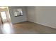 Open floorplan with views from the living room to the kitchen at 11511 113Th St # 4F, Seminole, FL 33778
