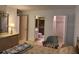Bedroom with a view of a bathroom and a closet at 1258 Pine Ridge W Cir # F1, Tarpon Springs, FL 34688