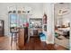 Entertain in style at the bar area with backyard access and view into the primary bedroom at 13523 Meadow Golf Ave, Hudson, FL 34669