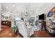 Bright living space featuring hardwood floors, high ceilings, and expansive views at 13523 Meadow Golf Ave, Hudson, FL 34669