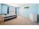 Bright bedroom with a double window, carpet, and blue walls at 13722 Lakemont Dr, Hudson, FL 34669