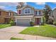 Charming home featuring a two-car garage, fresh landscaping, and a cozy front entrance at 13722 Lakemont Dr, Hudson, FL 34669