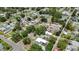 Aerial shot of a quaint neighborhood with tree-lined streets and cozy homes at 1416 55Th N Ave, St Petersburg, FL 33703