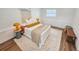 Cozy bedroom featuring a bed with soft textures, unique lamps, and stylish decor at 1416 55Th N Ave, St Petersburg, FL 33703