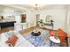 Beautiful living room flowing to the kitchen with hardwood floors and abundant natural light at 1416 55Th N Ave, St Petersburg, FL 33703