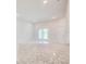 Open-concept living room with a view of the kitchen featuring a large island at 16433 66Th E Ln, Parrish, FL 34219