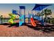 Community playground with slides, climbing structures, and safety surfacing at 16433 66Th E Ln, Parrish, FL 34219